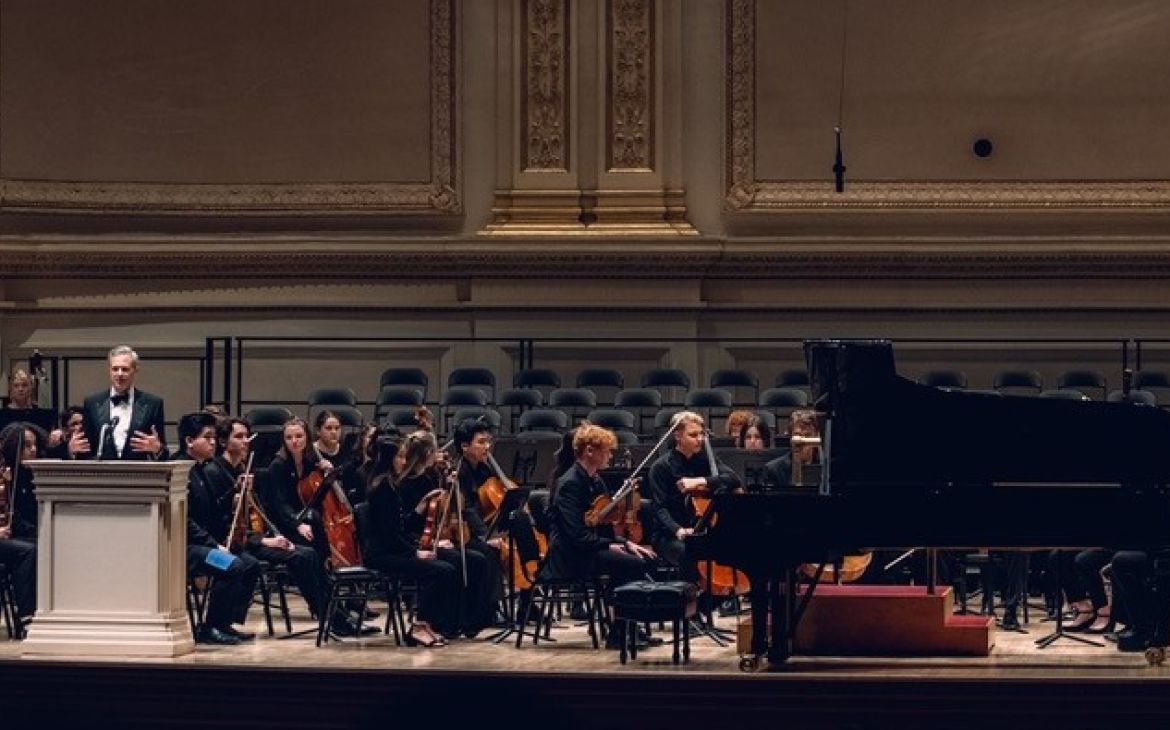 President Benjamin Woodroffe and the orchestra