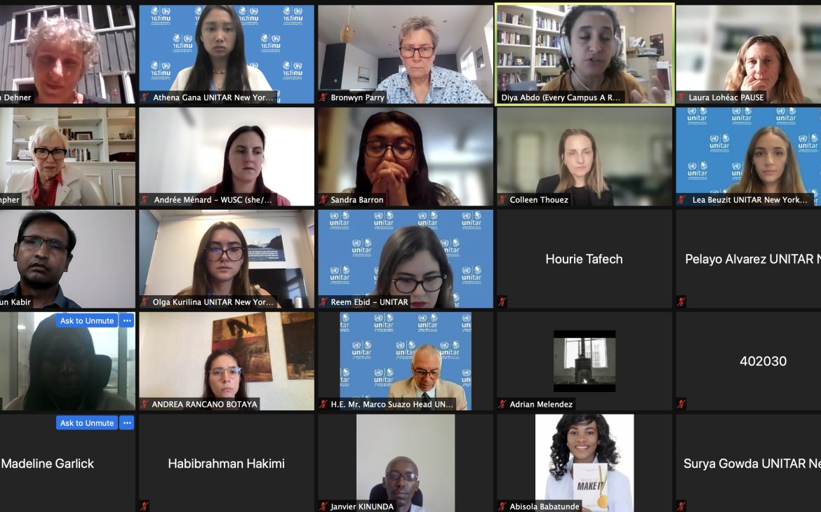 Participants Listen As Panelists Speak About Refugees	