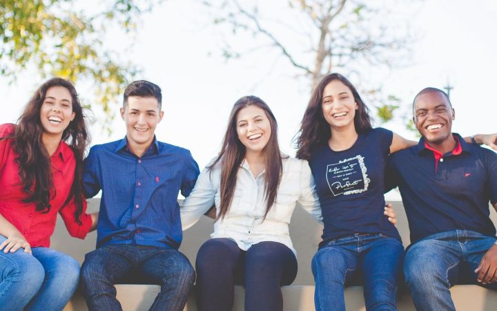 Youth sitting on a wall