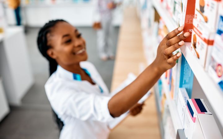 Pharmacist getting medicine from the shelf   (Photo via Envato Elements) 
