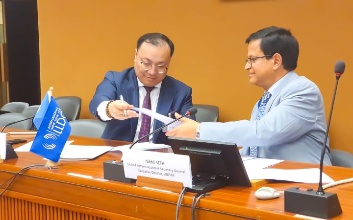 MOU signing in Palais des Nations at the United Nations Office at Geneva (UNOG) by Mr. Nikhil Seth, Executive Director of UNITAR (right) and Mr. Dulguun Damdin-Od, Executive Director of ITTLLDC.
