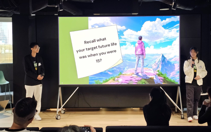 Agnes Chiu and her brother Bryan Chiu presenting their project at an event.