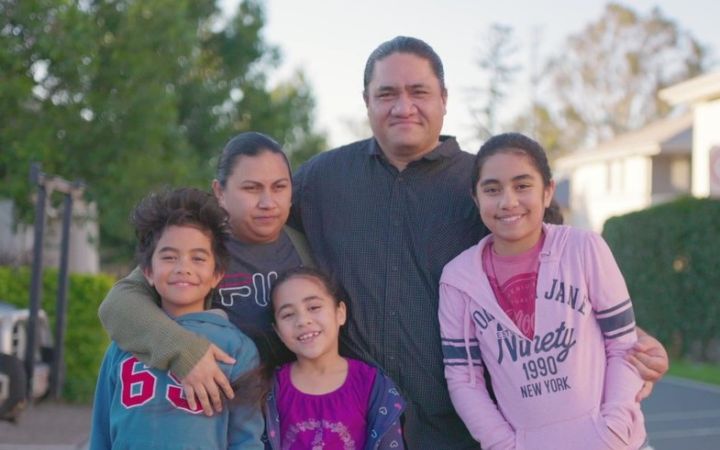 Anzonetta and Jared pose with their children born after the Tsunami