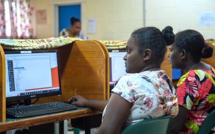Two beneficiairies from the Solomon Island training