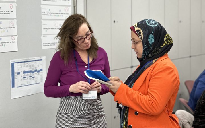 UNITAR mentor discussing with the learner