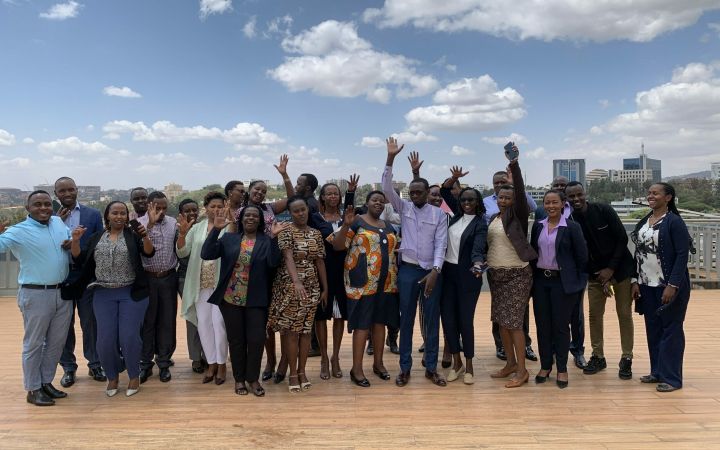 Training participants posing happily for a picture.