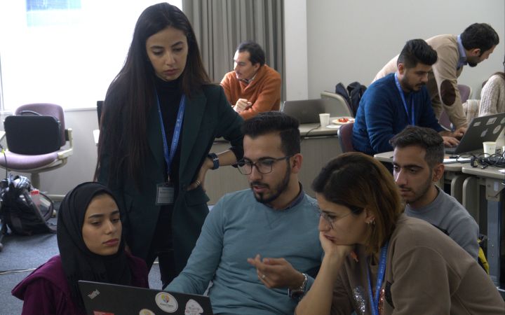 Young entrepreneurs working in groups