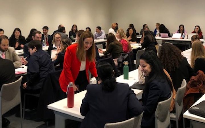 Prof Carter discussing with delegates during exercise