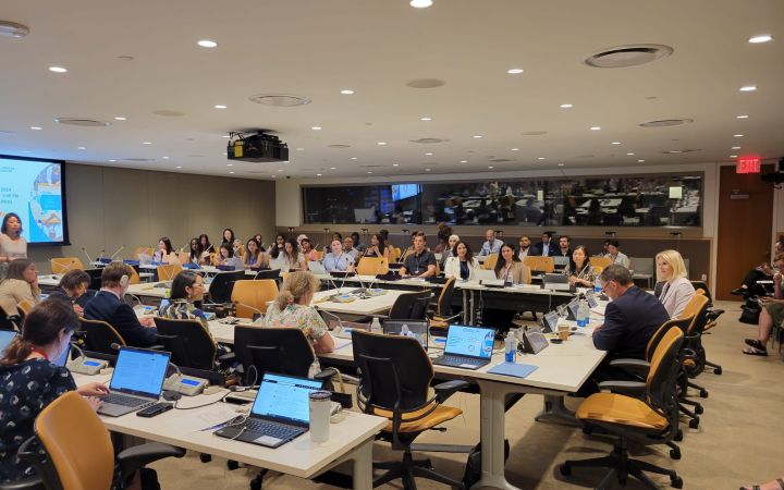 Full room of participants wait for the Opening Segment to begin