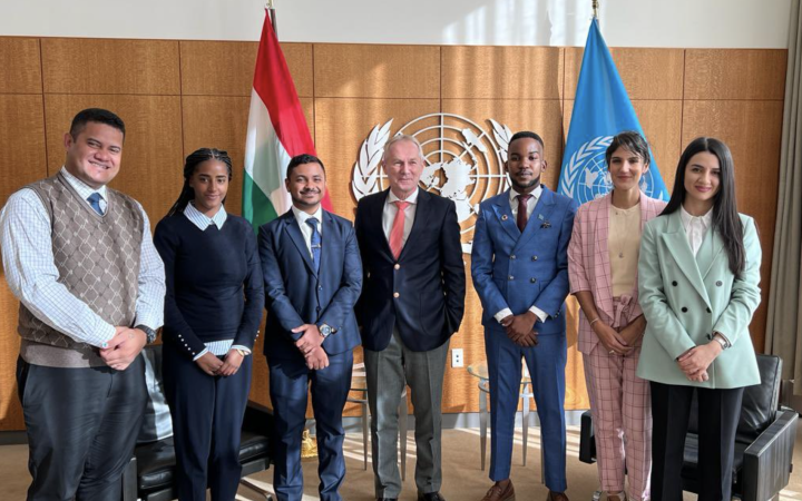 H.E. Mr. Csaba Kőrösi posing for with the six chosen 2023 PGA Fellows