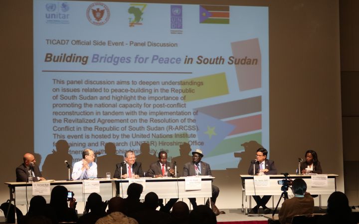 Panelists present on stage during the session 