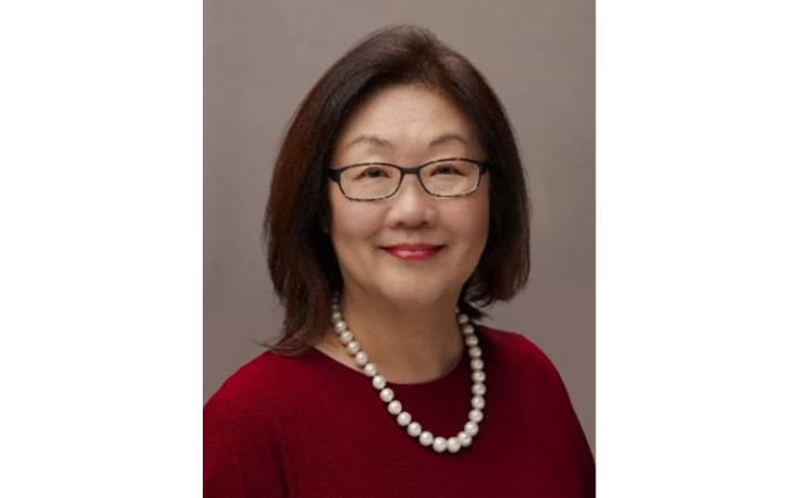  Smiling professional Asian women wearing glasses