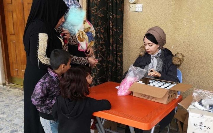 Zahraa in December of 2019 delivering primary healthcare services, mental health and gender based violence services to rural zones after conflict