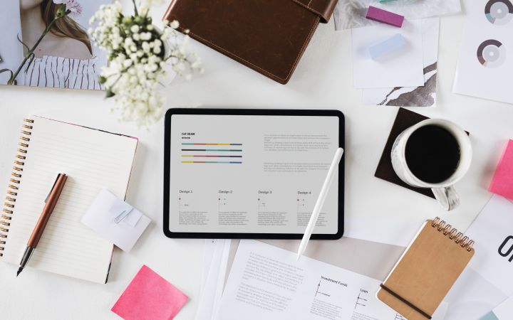 Digital Tablets and Business Graphs. Photo by Envato Elements