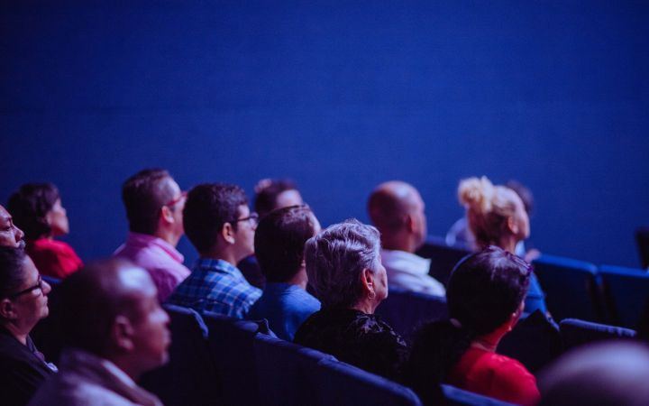 People sitting in a conference hall 