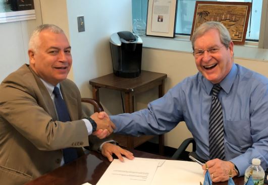 Mr. Marco Suazo and Mr. Michael Goodman (right)