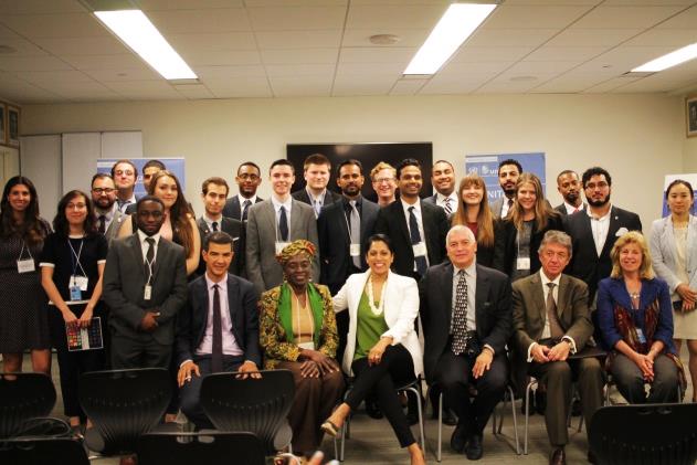 Mr. Suazo with panelists and students attending the event