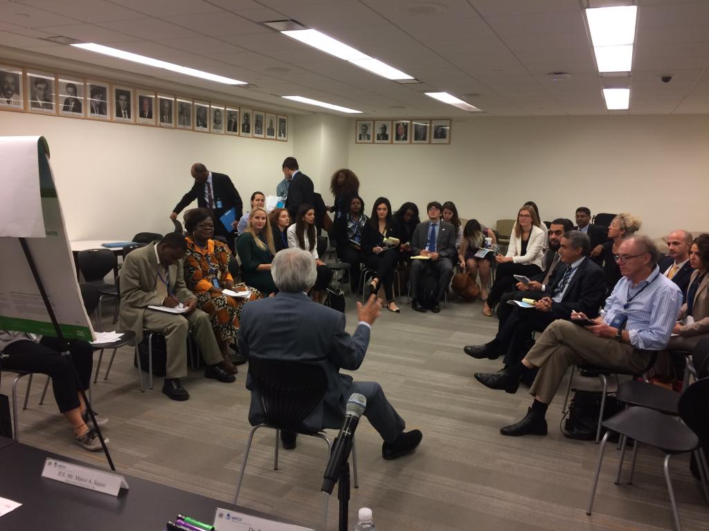 Participants engage with Professor Lee on negotiation tactics